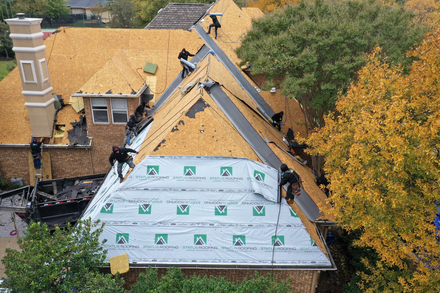 Roof replacement by Status Roofing